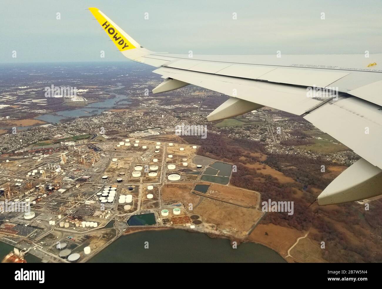 Philadelphia, Pennsylvania, U.S.A - March 13, 2020 - The view of the industrial area from the window of a Spirit Airlines plane Stock Photo