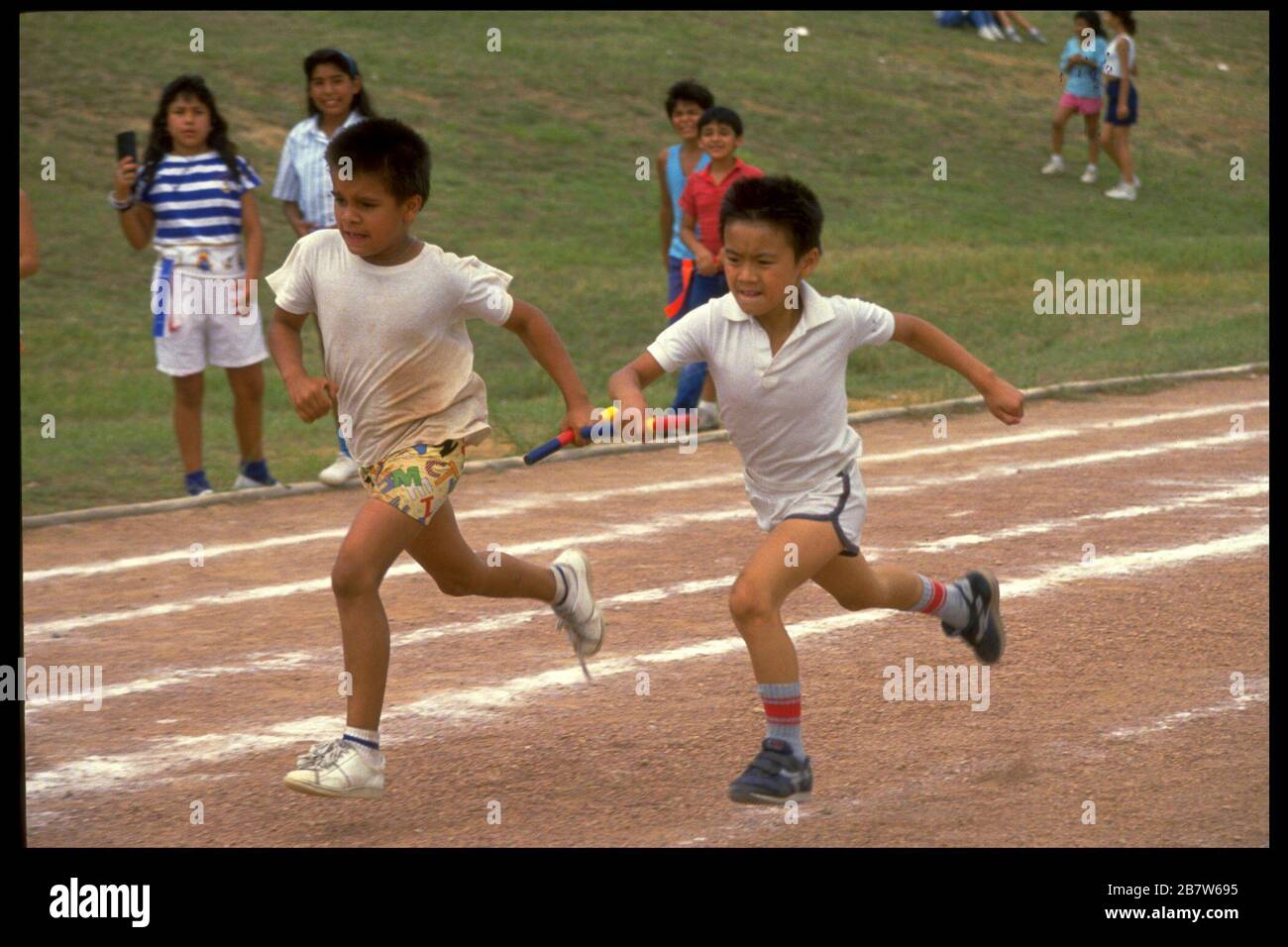 Austin, Texas USA Elementary schoolaged boys competing in sprint