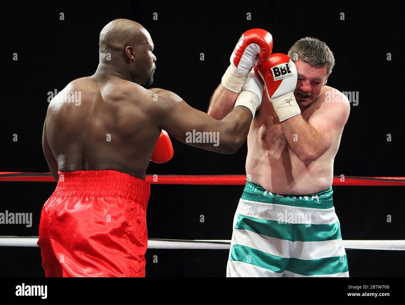 Larry Olubamiwo (red shorts) defeats Colin Kenna in a Heavyweight ...