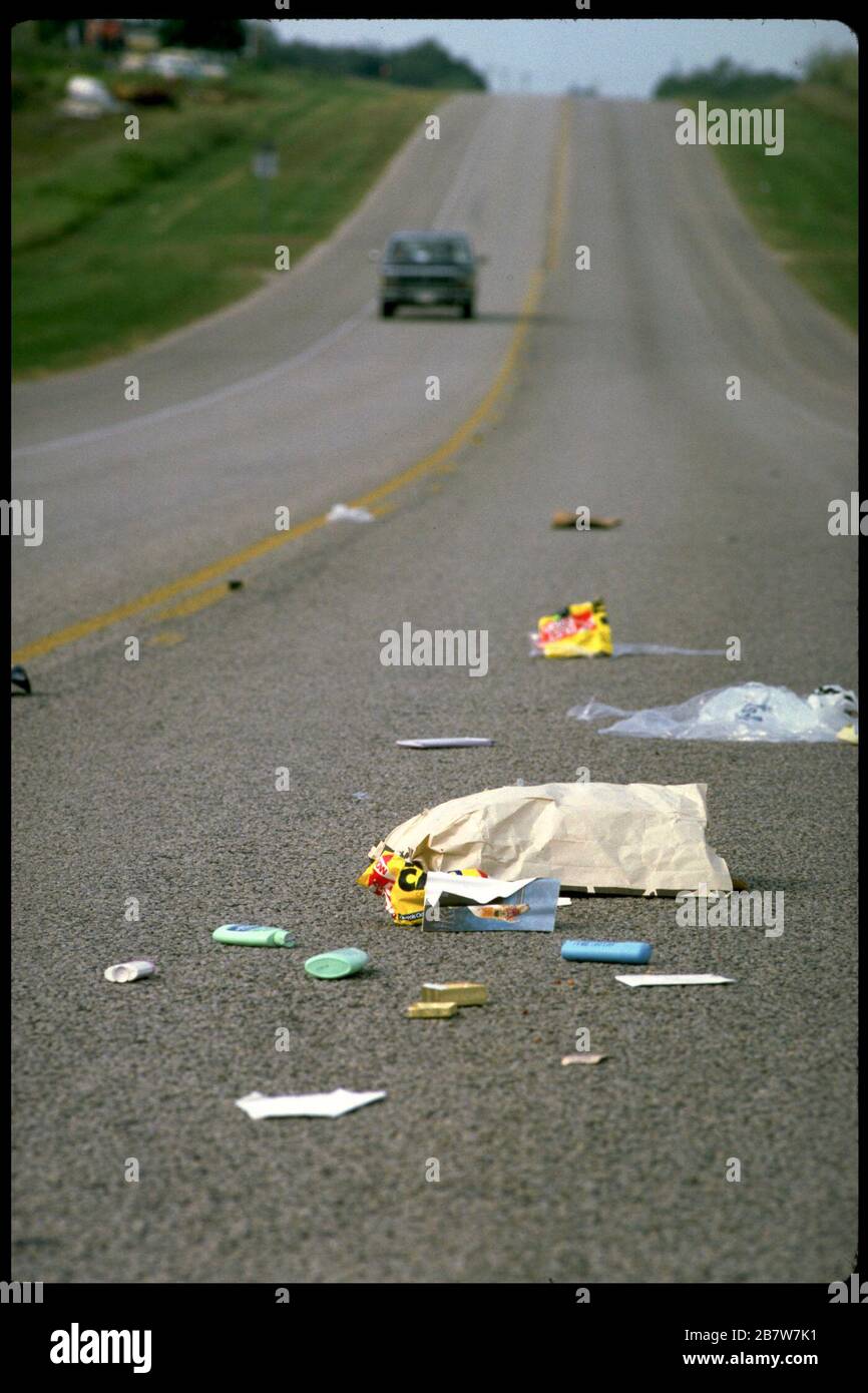 Trash littering rural highway in South Texas. ©Bob Daemmrich Stock