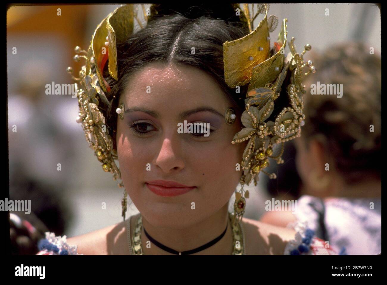 San Antonio, Texas USA Hispanic woman wears elaborate headdress as