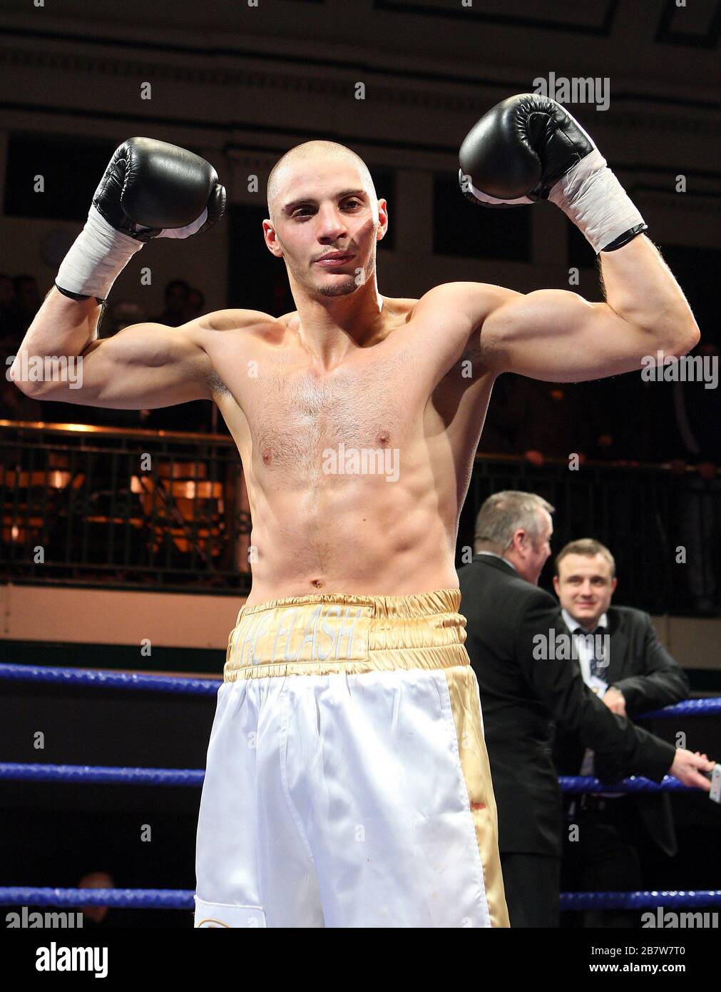 Chris Evangelou (white/gold shorts) defeats Johnny Greaves in a Light- Welterweight boxing contest at York Hall, Bethnal Green, promoted Barry Hearn Stock Photo - Alamy