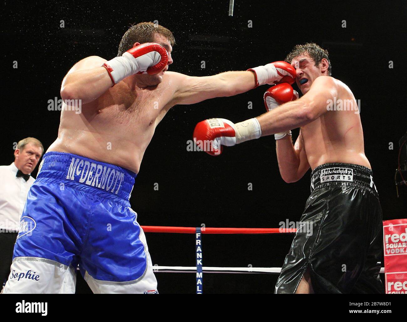 Tyson Fury (black shorts) defeats John McDermott in a Heavyweight ...