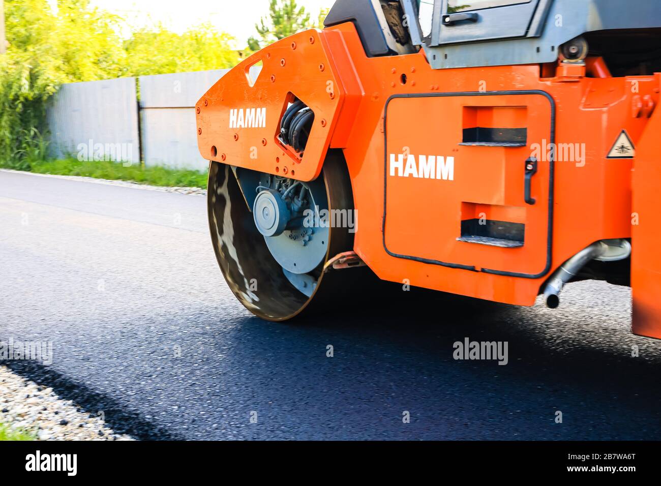 Asphalt Inmotion Asphalt compactor in motion hi-res stock photography and images - Alamy