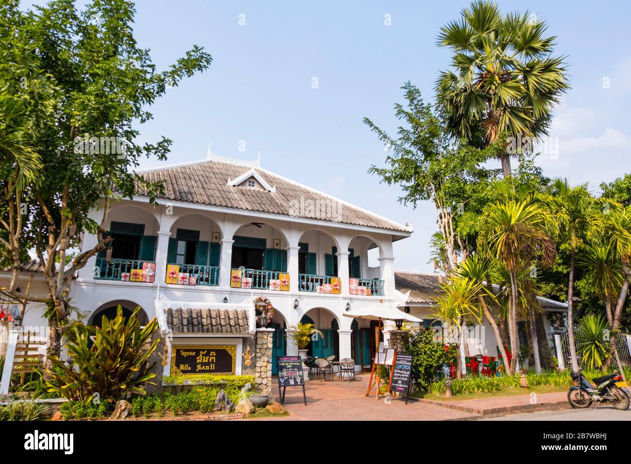 Villa Santi, hotel and restaurant, Sakkaline Road, old town, Luang Prabang, Laos Stock Photo