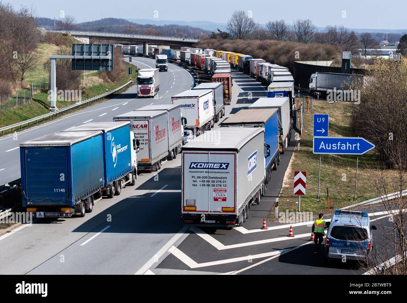 Bautzen, Germany. 18th Mar, 2020. Trucks are jammed on the motorway A4  Dresden - Görlitz near Bautzen. The effects of the spread of the  coronavirus are now also being felt on the