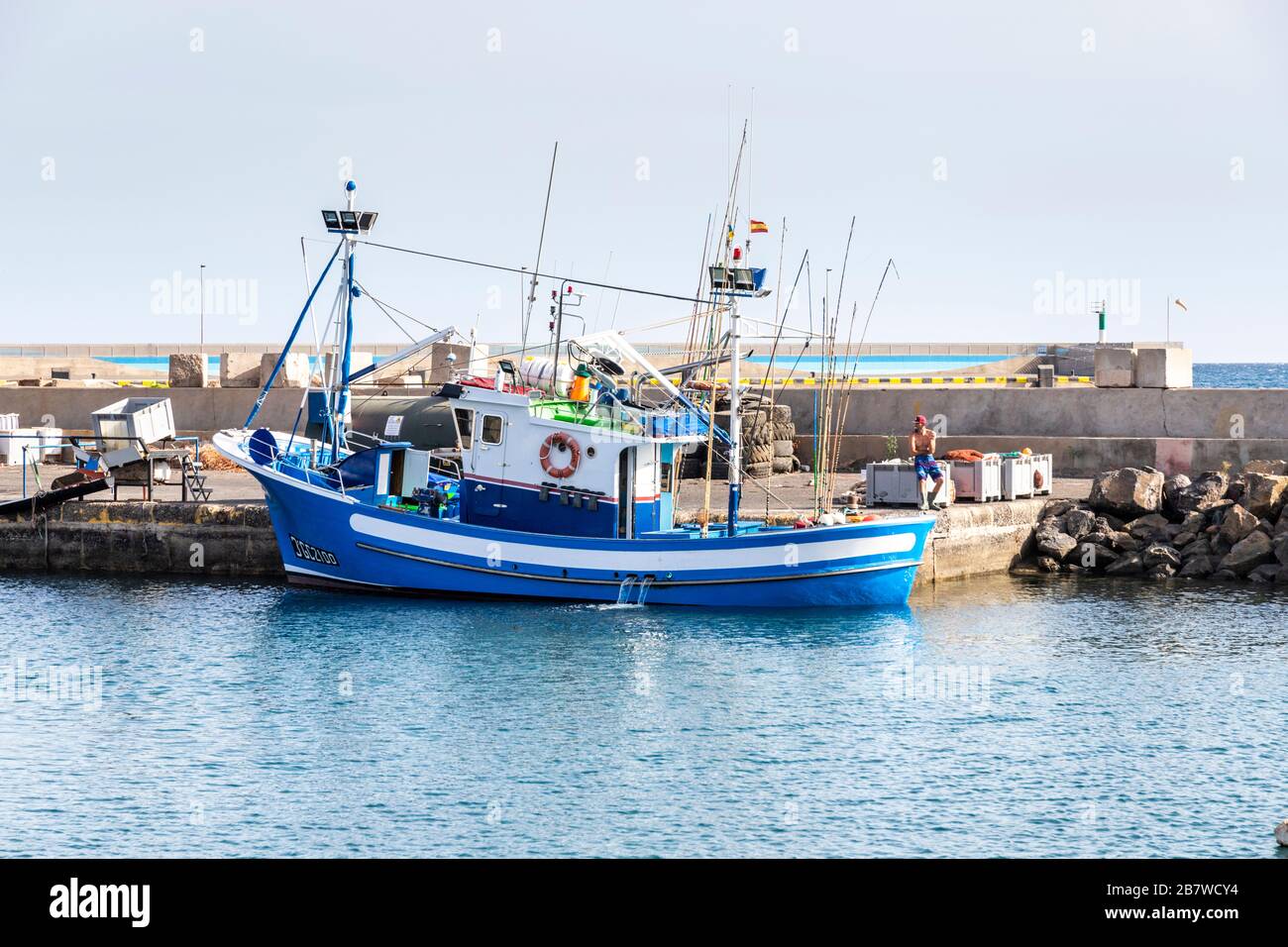 A fishing boat in the harbour at Gran Tarajal on the east coast of the Canary Island of Fuerteventura Stock Photo
