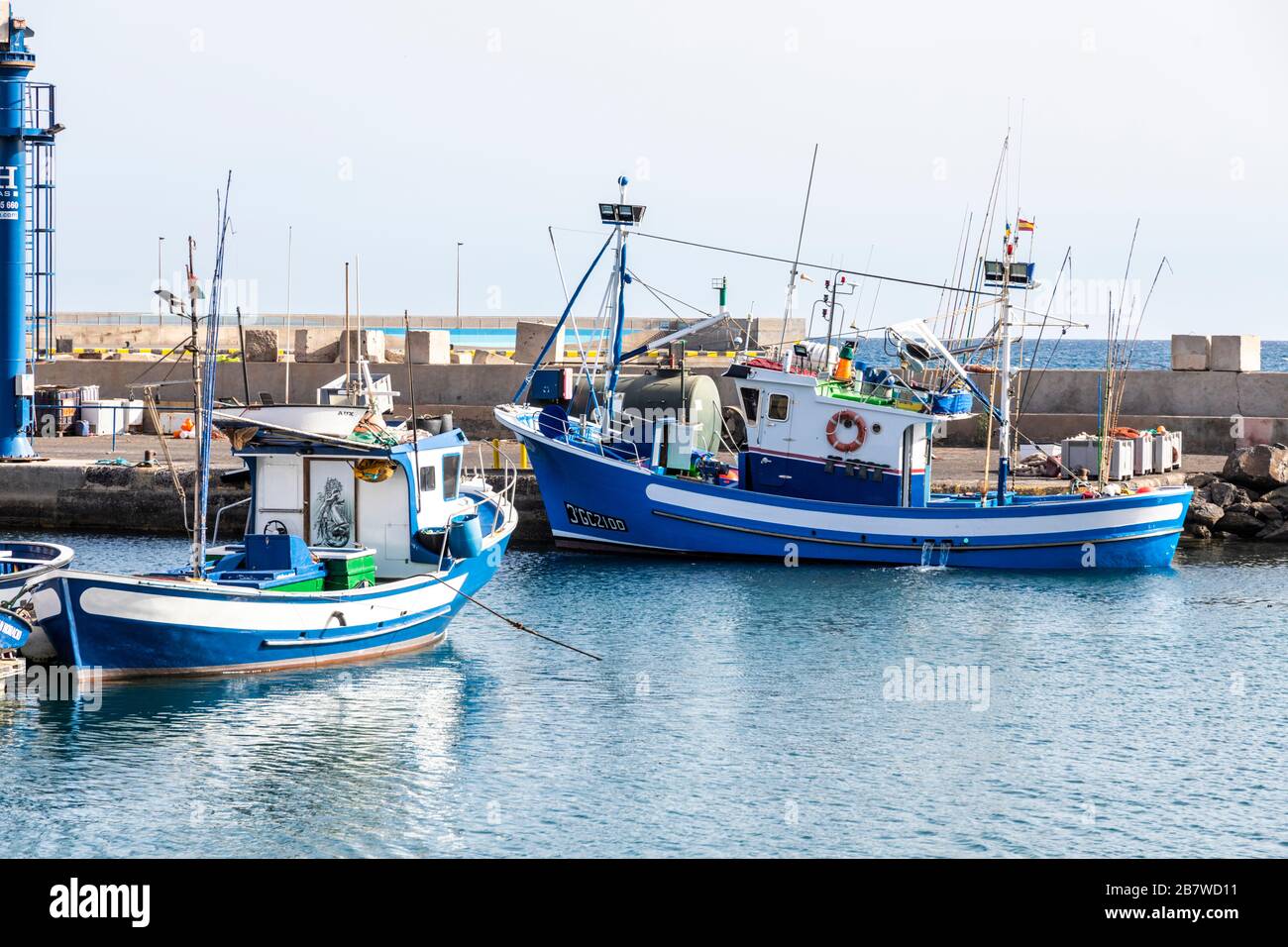 Fishing boats in the harbour at Gran Tarajal on the east coast of the Canary Island of Fuerteventura Stock Photo