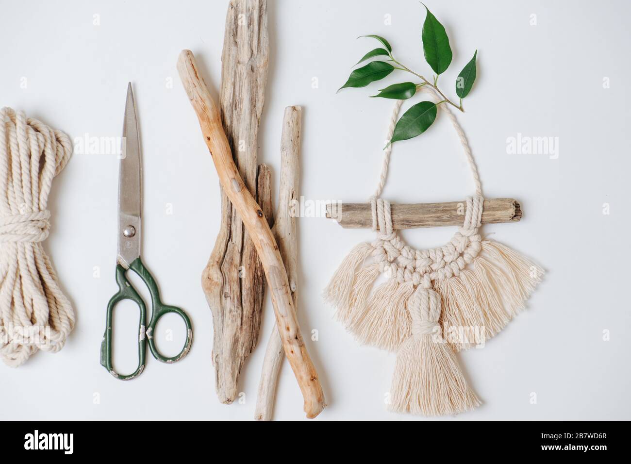 Everything for weaving macrame, rope, scissors and sticks Stock Photo