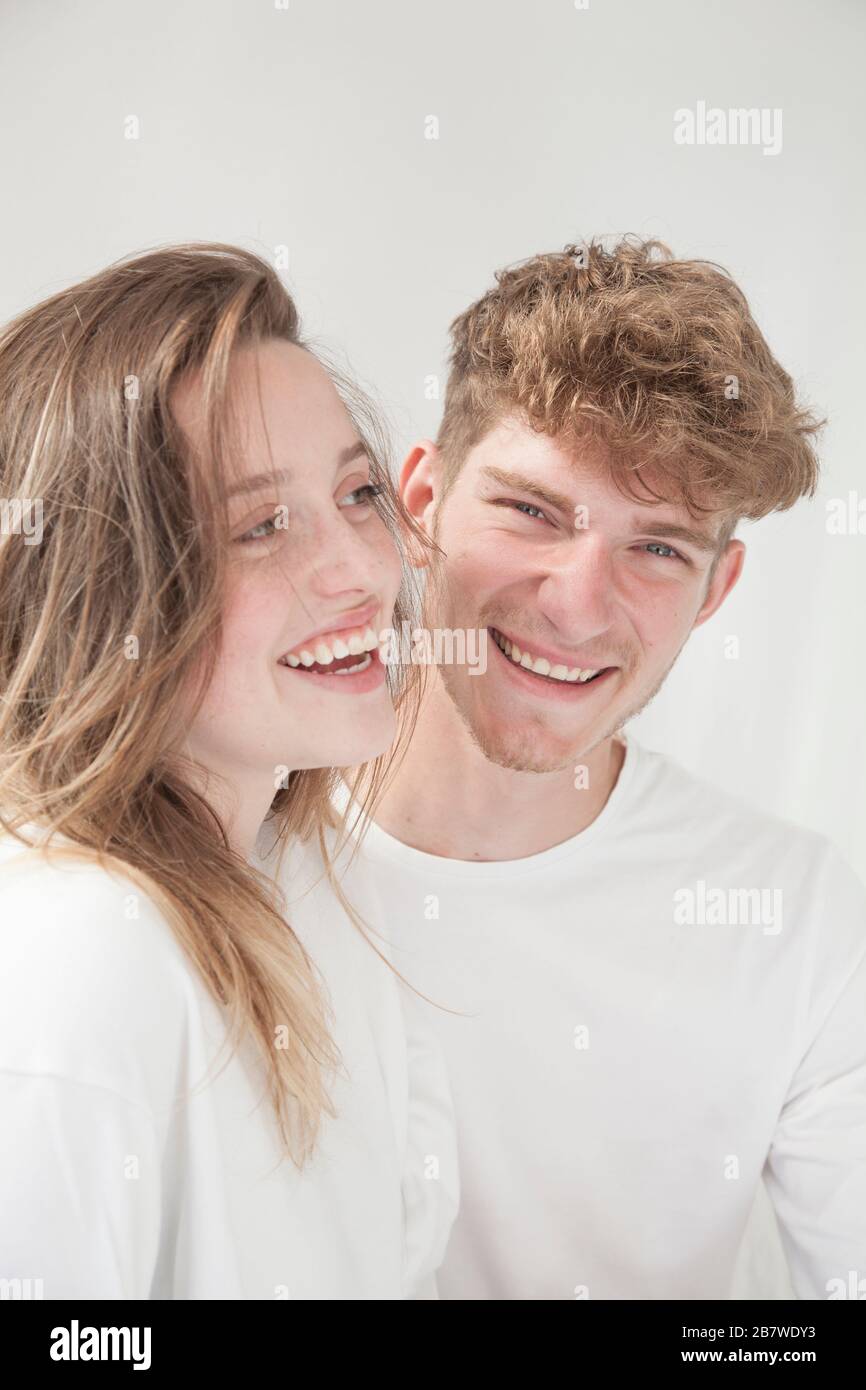 Portrait of Young Couple Smiling Stock Photo