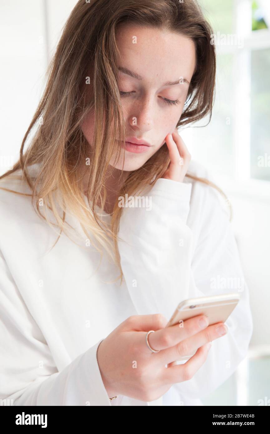 Teenage Girl Using Smartphone Stock Photo