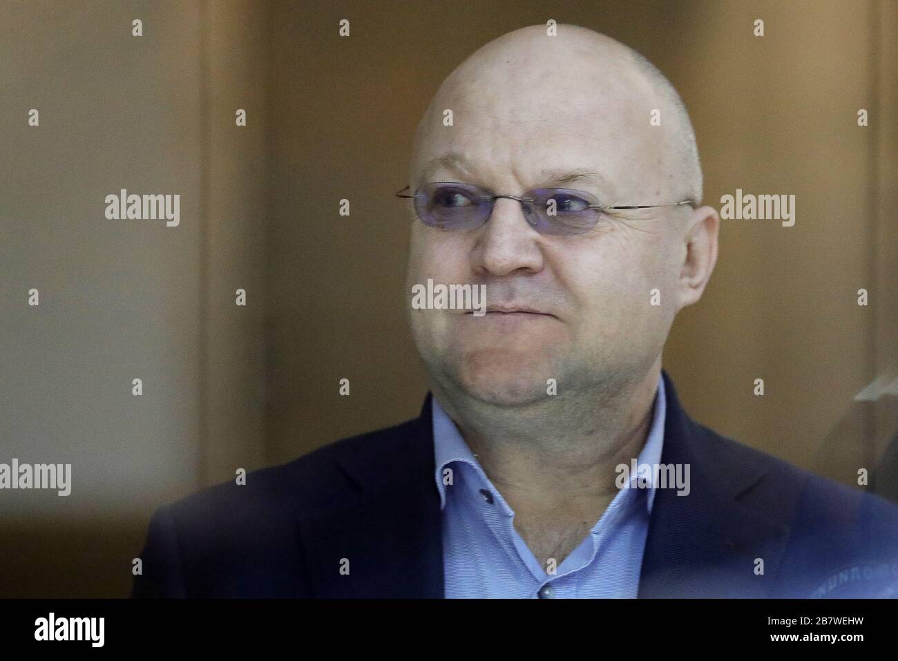 Moscow, Russia. 18th Mar, 2020. MOSCOW, RUSSIA - MARCH 18, 2020: Former head of the Moscow Department of the Investigative Committee of Russia, Alexander Drymanov, appears for a sentencin hearing at Moscow City Court. Drymanov was arrested by officers of Russia's Federal Security Service (FSB) and charged with bribe-taking in July 2018. The court has found Drymanov guilty of bribe taking and sentenced him to 12 years in a maximum security prison colony. According to the investigators, Drymanov was part of a criminal group lead by a former head of the Investigative Committee Department for Mosc Stock Photo