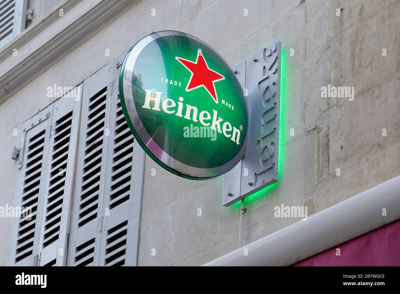 Bordeaux , Aquitaine / France - 01 15 2020 : Dutch brewing company Heineken Sign logo on wall bar Stock Photo
