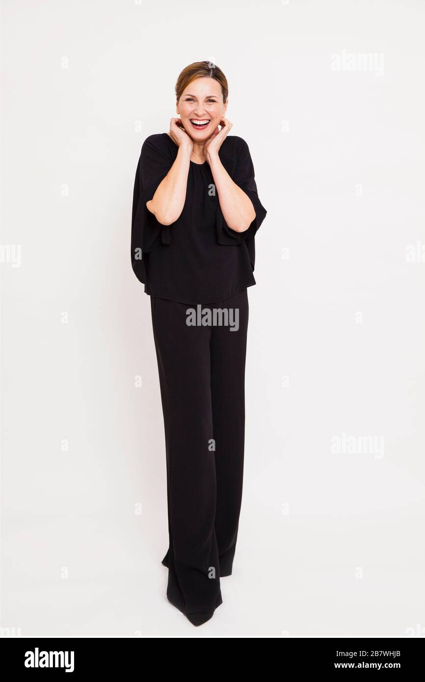 Smiling Woman in Evening Wear Stock Photo