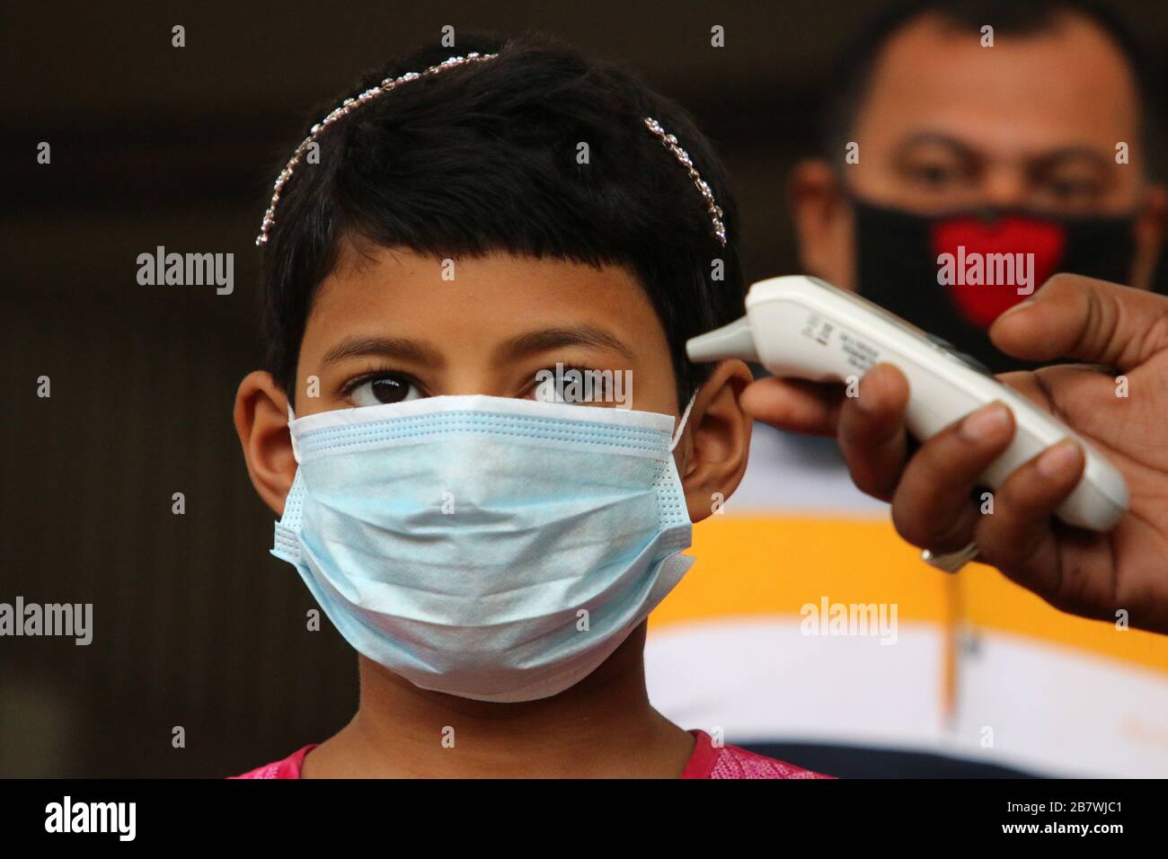 Dhaka, Bangladesh. 18th Mar, 2020. Thermal screening of passengers is being conducted in the wake of deadly coronavirus, at Dhaka Railway Station.Bangladesh has recorded its first death from coronavirus, which has killed over 7,800 people from across the world in a global pandemic. Institute of Epidemiology, Disease Control and Research (IEDCR) added that four new cases of Covid-19 have been confirmed, taking the total number of confirmed coronavirus patients in Bangladesh to 14. Credit: SOPA Images Limited/Alamy Live News Stock Photo