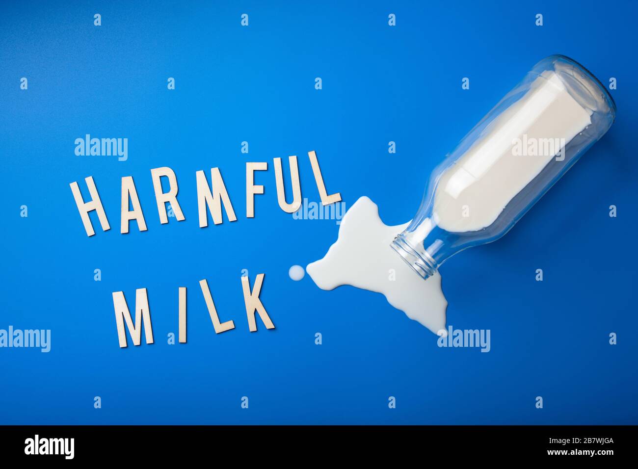 harmful milk word text letters lactose intolerance allergy. milk