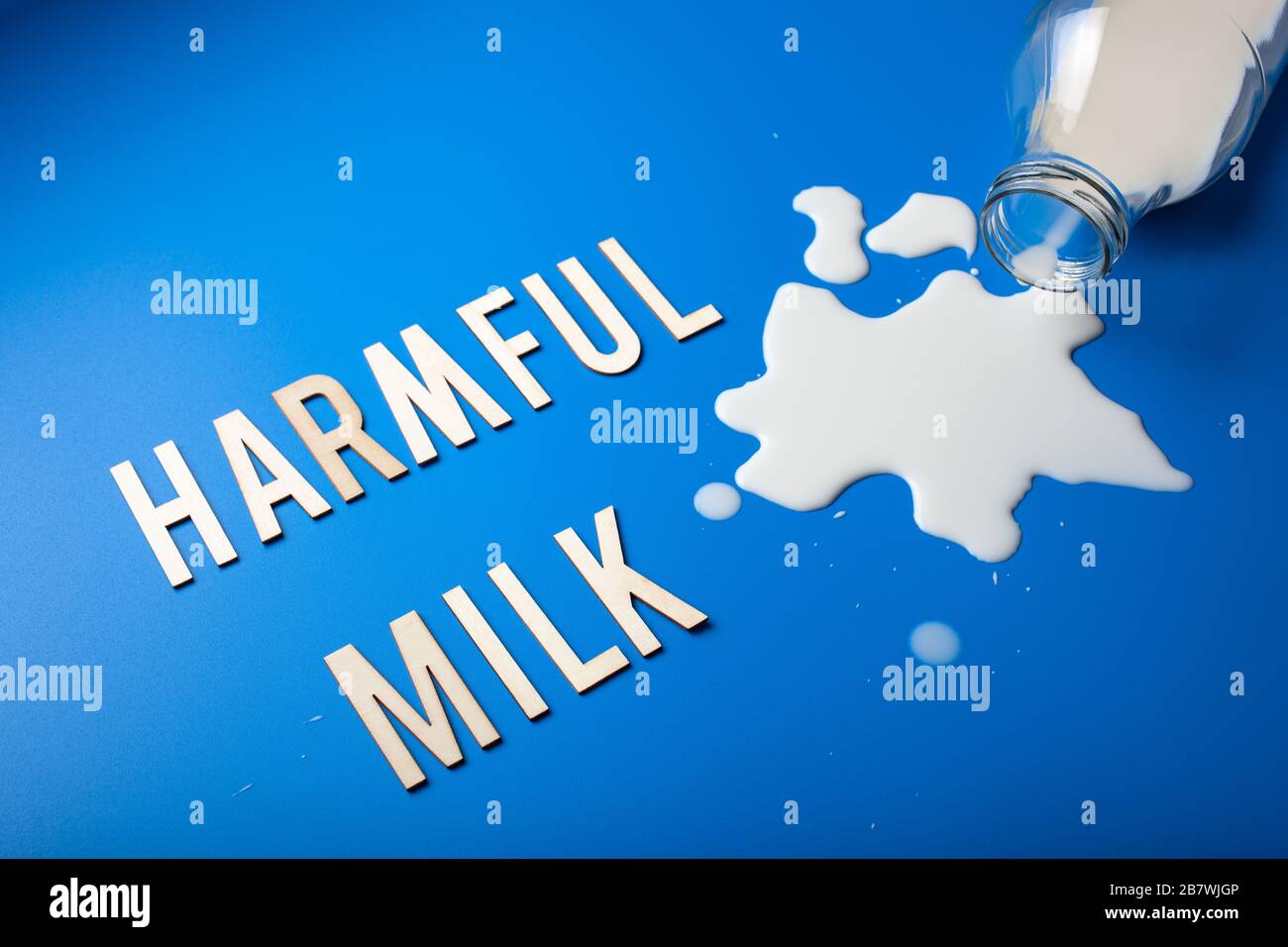 harmful milk word text letters lactose intolerance allergy. milk