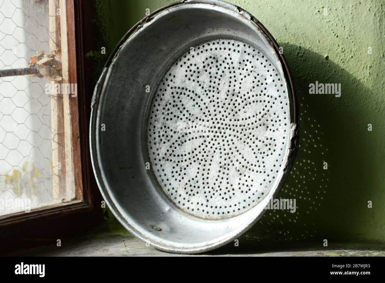 Old rusty metal sieve hi-res stock photography and images - Alamy