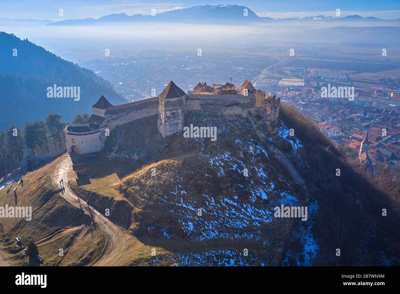 Aerial view of View of Rasnov Fortress and Rasnov city in Brașov ...