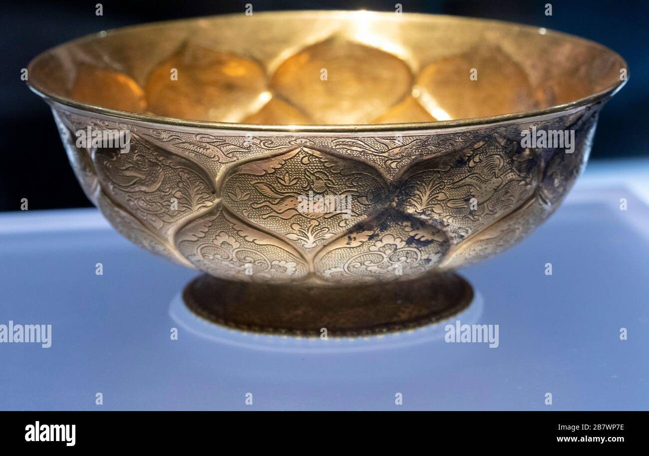 gold bowl with mandarin duck and lotus pattern,  Tang Dynasty, excavated from Hejiacun, Xian City, Xian History Museum, Xian, China Stock Photo