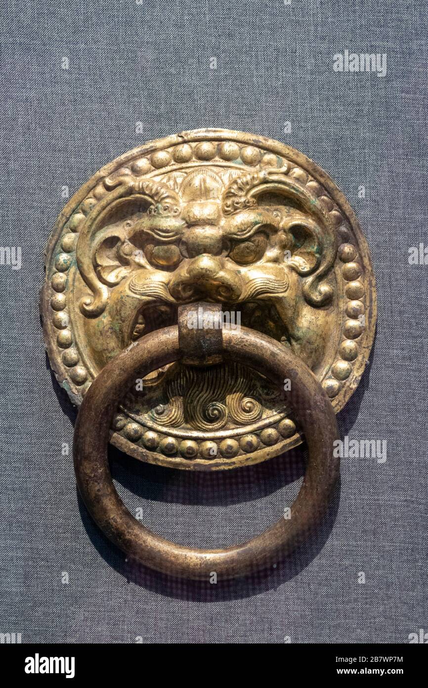 Tang dynasty gilt door knocker from Daming Palace, Xian city, Shaanxi History Museum, Xian, China Stock Photo