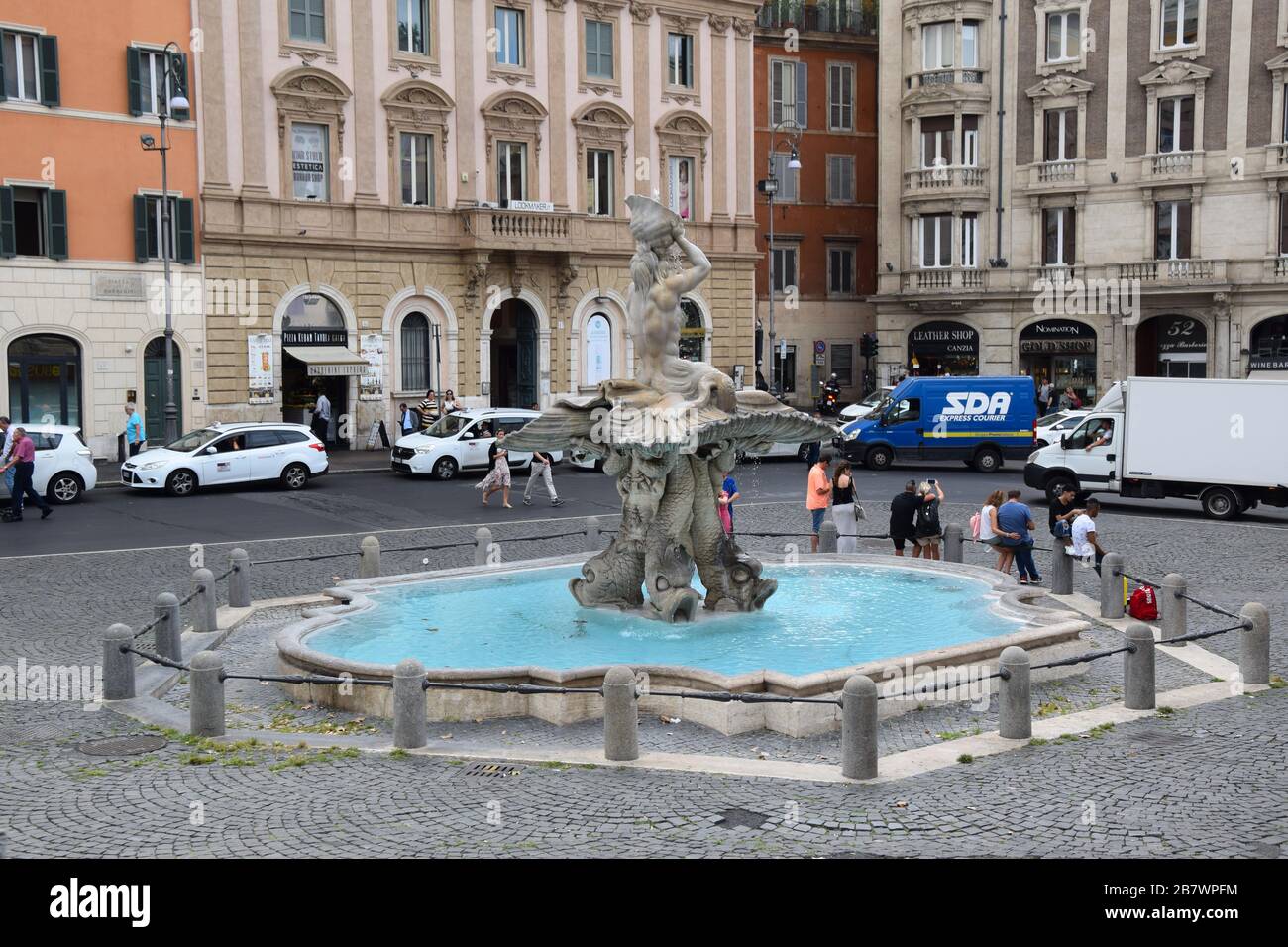 Fontana del Tritone di Palazzo Margherita - Triton Fountain on Piazza Barberini in Rome, Italy Stock Photo