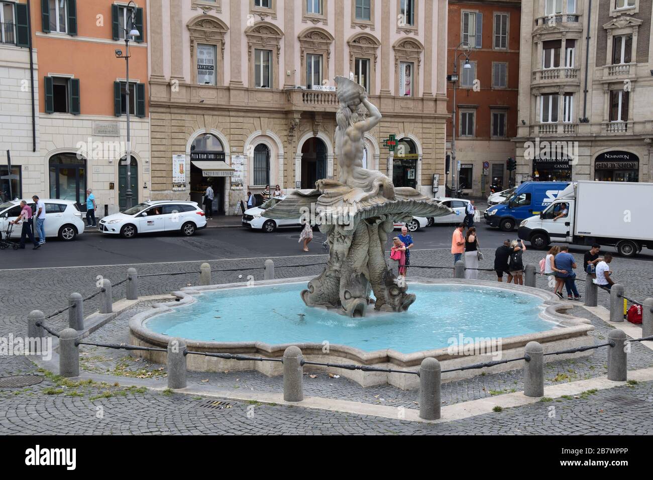 Fontana del Tritone di Palazzo Margherita - Triton Fountain on Piazza Barberini in Rome, Italy Stock Photo