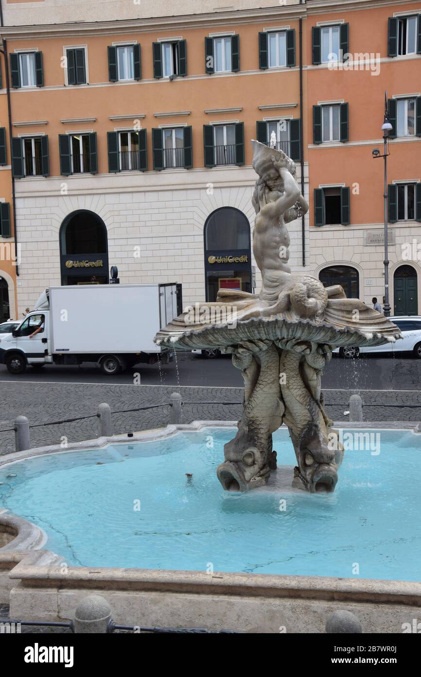 Fontana del Tritone di Palazzo Margherita - Triton Fountain on Piazza Barberini in Rome, Italy Stock Photo