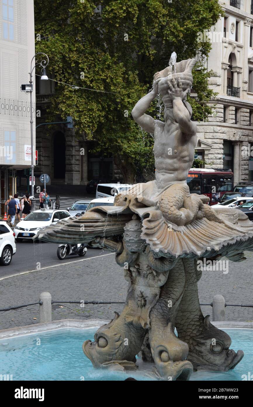 Fontana del Tritone di Palazzo Margherita - Triton Fountain on Piazza Barberini in Rome, Italy Stock Photo