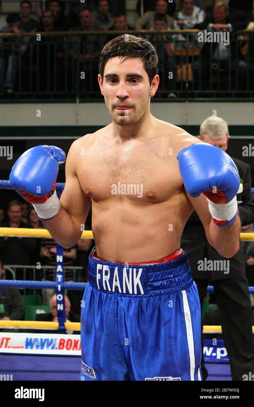 Frank Buglioni (blue shorts) defeats Paul Morby in a SuperMiddleweight