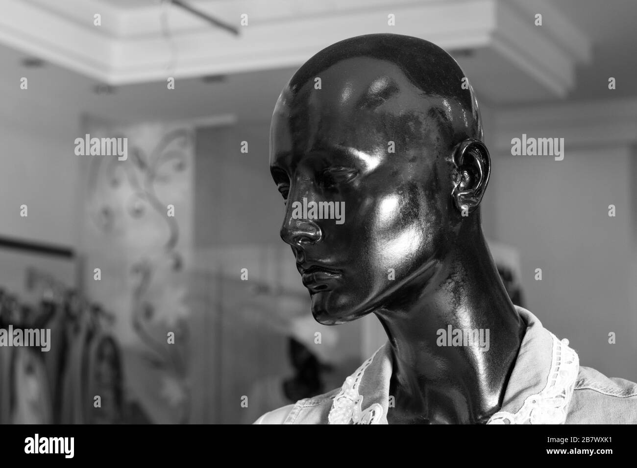 Detail of a female fashion mannequin head in a store. black and white. Copy space Stock Photo