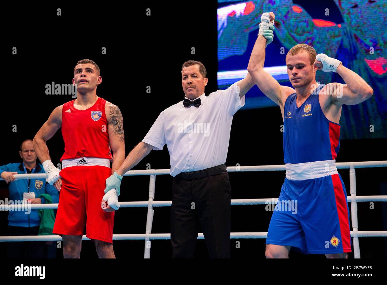 London, UK. 14-03-20. Besart Pireva (KOS) RED fights Andrei Vreme (MDA) BLUE during the Road to Tokyo European Olympic Boxing Qualification Event Stock Photo