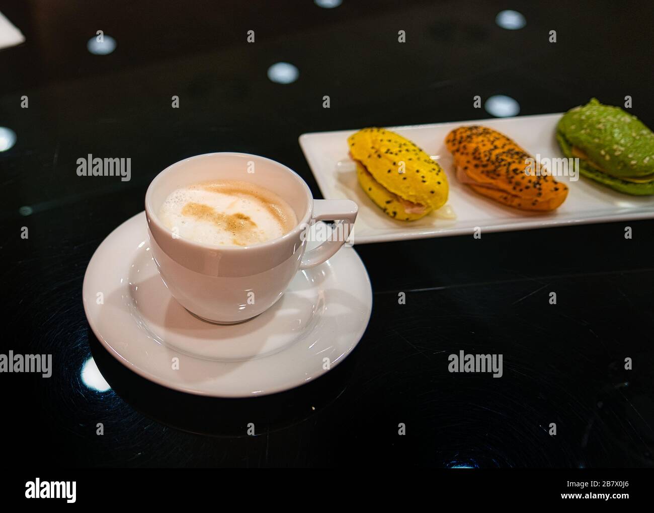 Finger food, sandwiches and a glass of champagne in an upscale atmosphere and business lounge Stock Photo