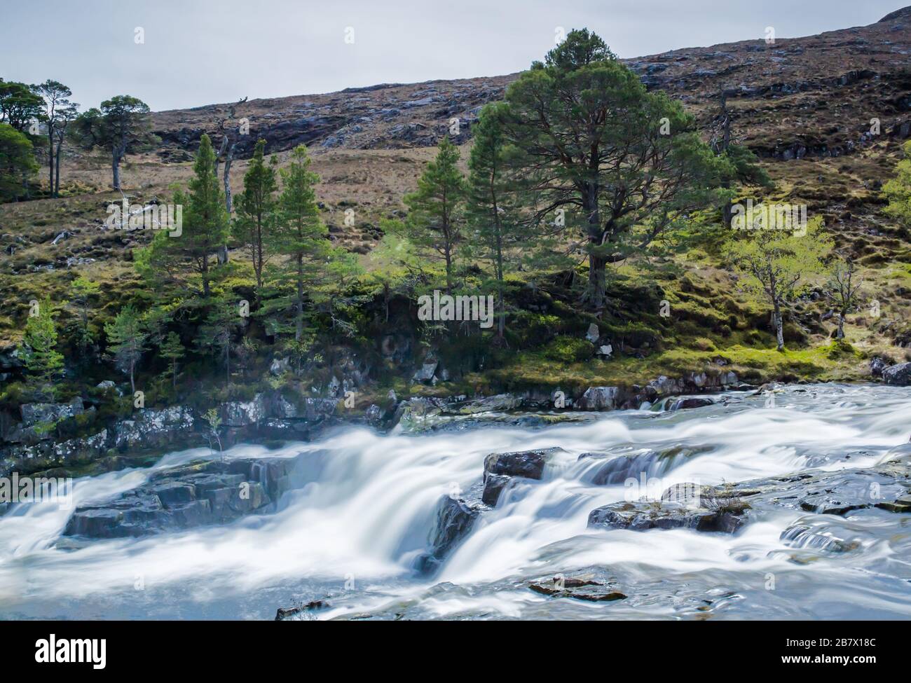 Falls on the Garbh uisge river just below Loch Monar at the head of Glen Strathfarrar, which empties into the River Farrar in Highlands of Scotland Stock Photo