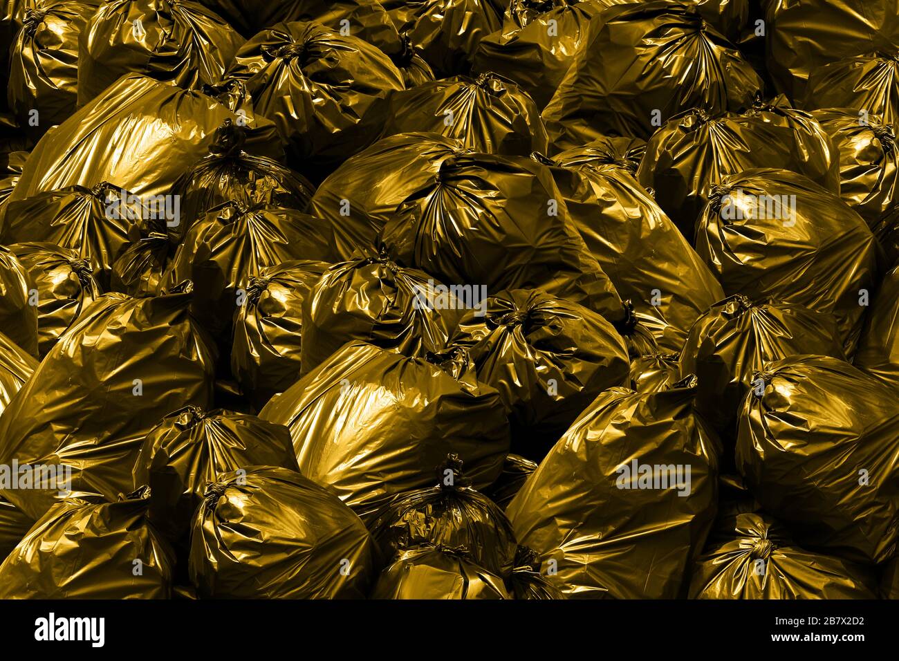 Background garbage dump Pollution Garbage bags with yellow and