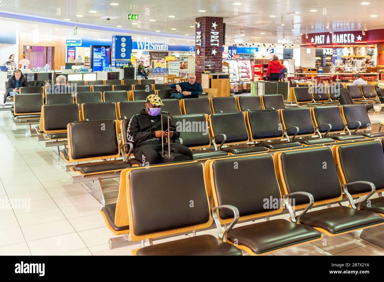 Birmingham, West Midlands, UK. 18th Mar, 2020. The departure lounge was deserted at Birmingham International Airport today as many people have chosen not to fly due to the Covid-19 pandemic. Flights have also been cancelled due to low passenger numbers. Credit: AG News/Alamy Live News Stock Photo