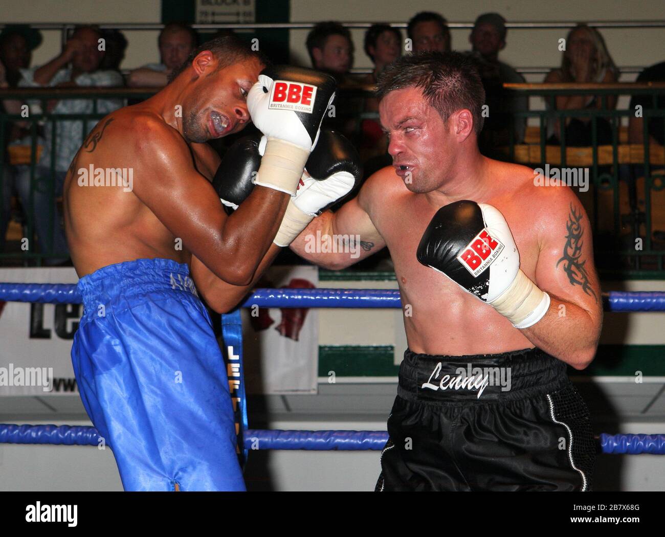 Billy Slate (black shorts) defeats Jame Ambler in a Light-Heavyweight boxing contest at York Hall, Bethnal Green, promoted by Miranda Carter / Left Ja Stock Photo
