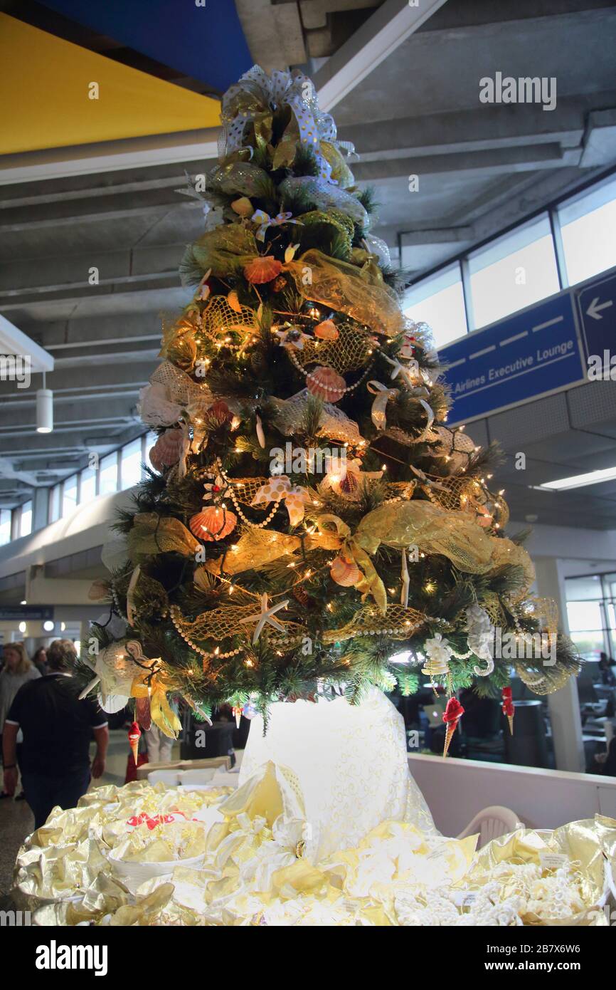 Barbados Grantly Adams International Airport Christmas Decorations on Sale - Christmas Tree Decorated with Sea Shells Stock Photo