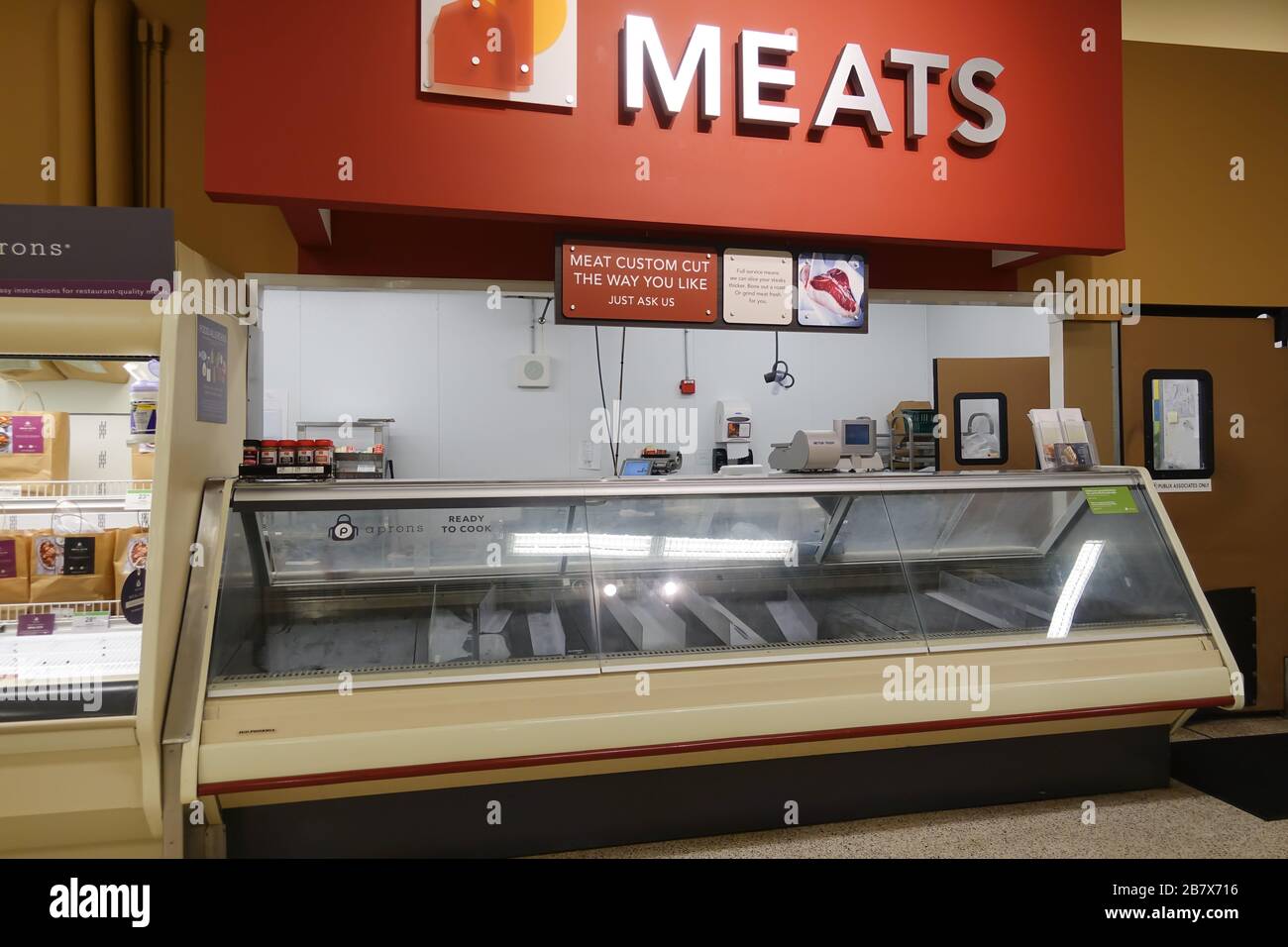 Orlando, FL/USA3/14//20 Empty meat display shelves at a Publix