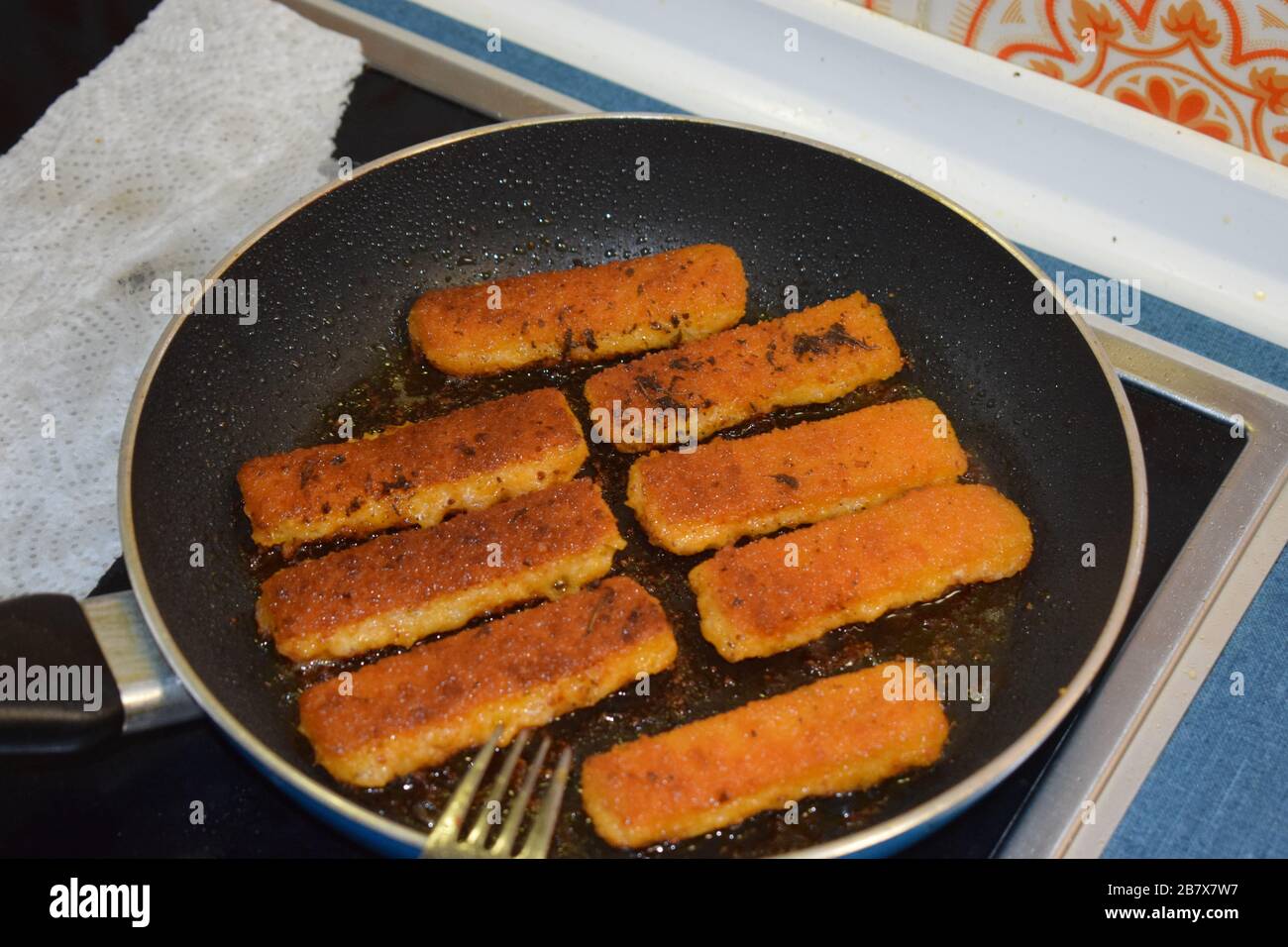 frying fish fingers Stock Photo Alamy