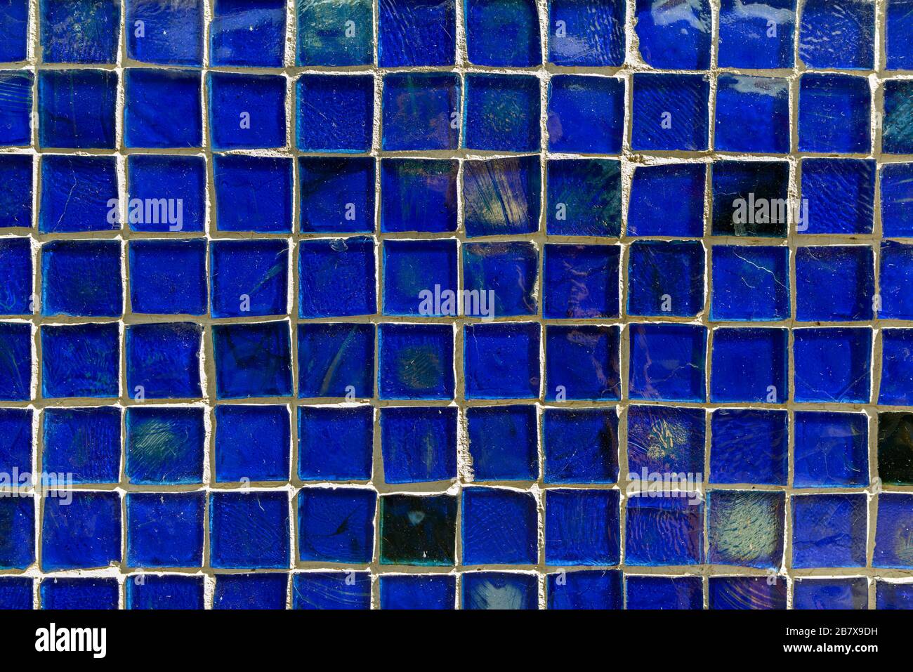 Abstract Background With Blue Tiles on Wall Stock Photo