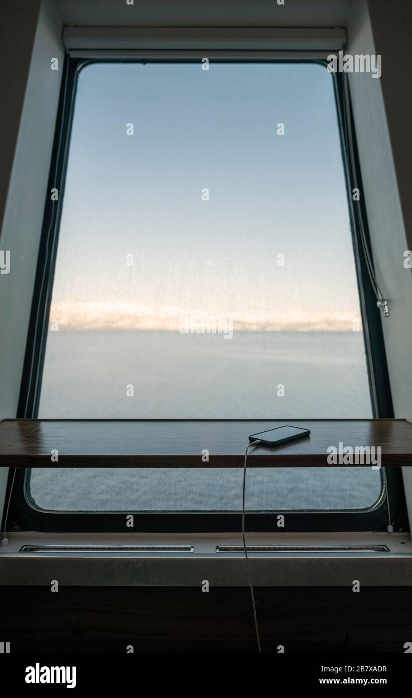 Window view from MS Polarlys, arctic Norway. Stock Photo