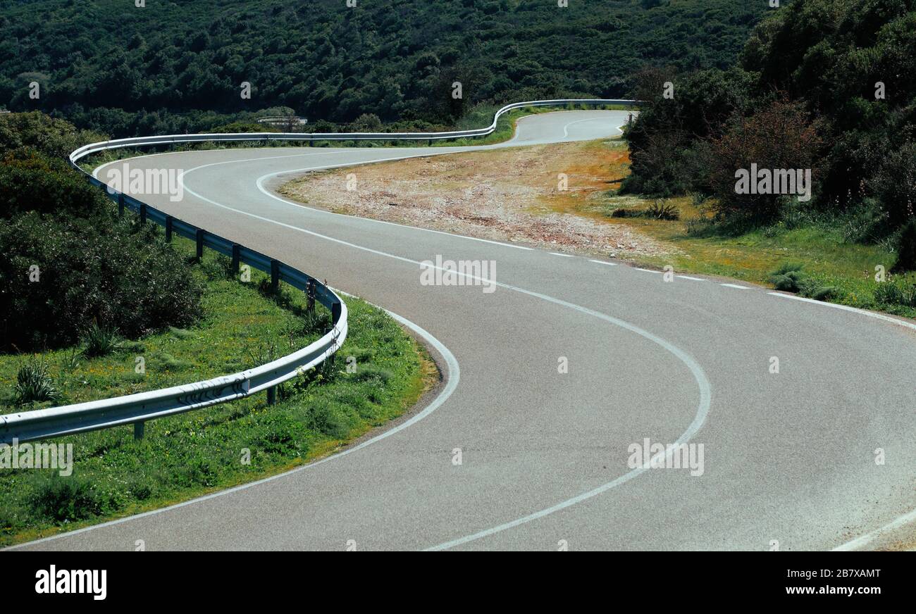 A simple curvy road in the countryside Stock Photo