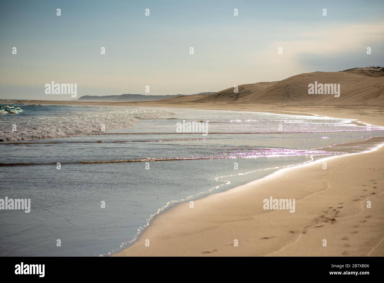 Empty sand beach ocean waves hi-res stock photography and images - Alamy