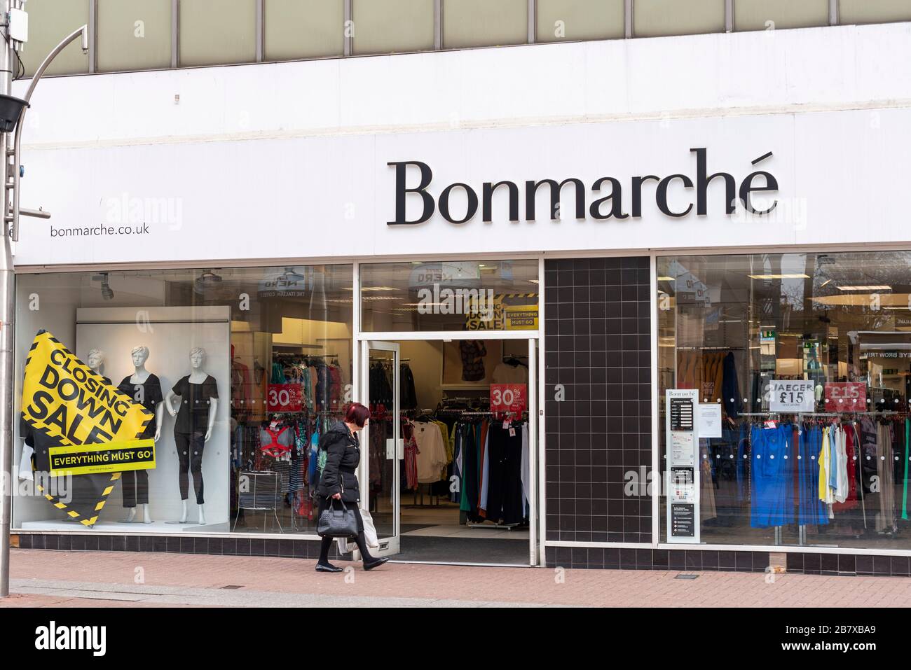Bonmarche shop in Southend on Sea, Essex, UK. Fashion business in administration with closing down sale sign. Collapsing. Person walking past Stock Photo