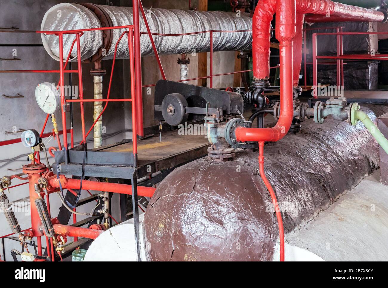 Steam boiler and heat exchanger in a gas boiler house. Gas boiler house equipment. Stock Photo