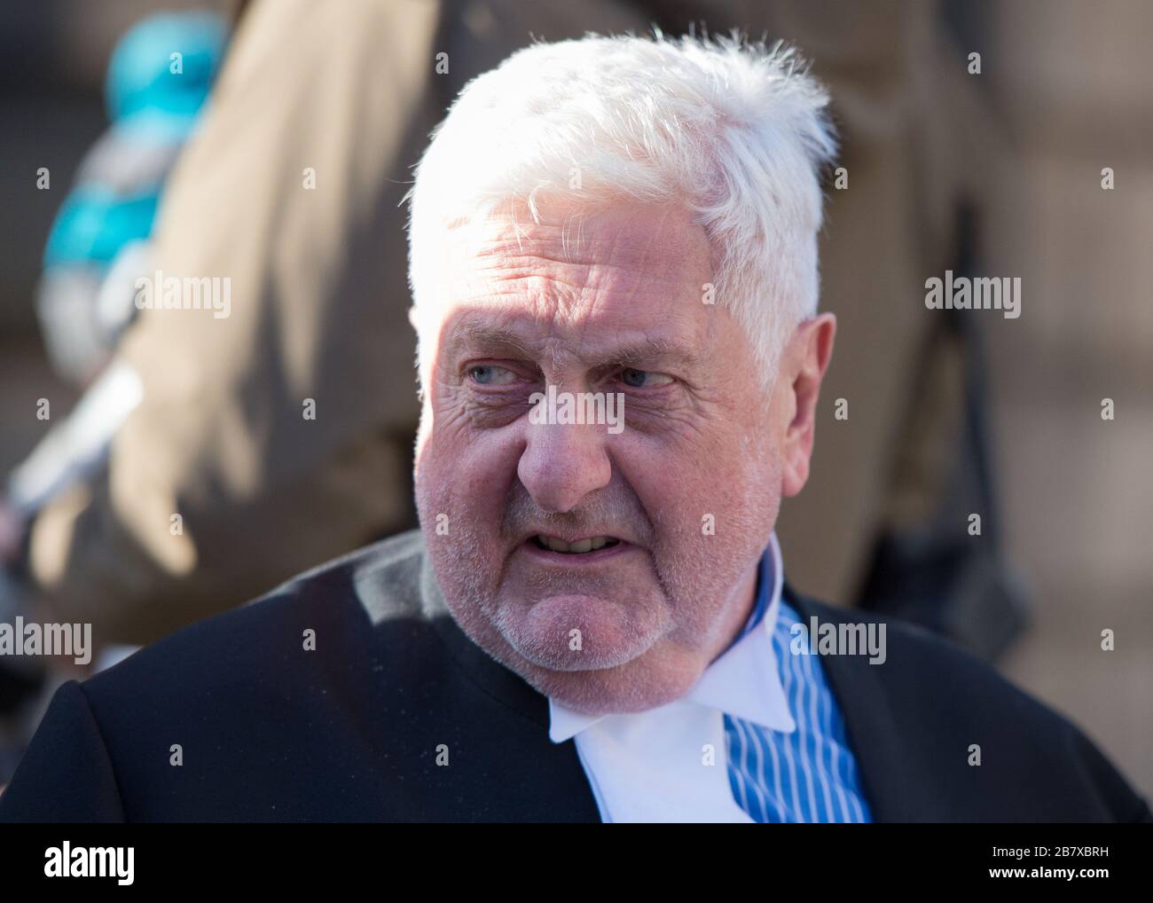 Edinburgh, UK. 18th Mar, 2020. Pictured: Gordon Jackson QC, Defence Advocate for Alex Salmond. A packed crowd consisting of awaiting Media, Press photographers and onlookers wait for him outside of the court. Credit: Colin Fisher/Alamy Live News Stock Photo