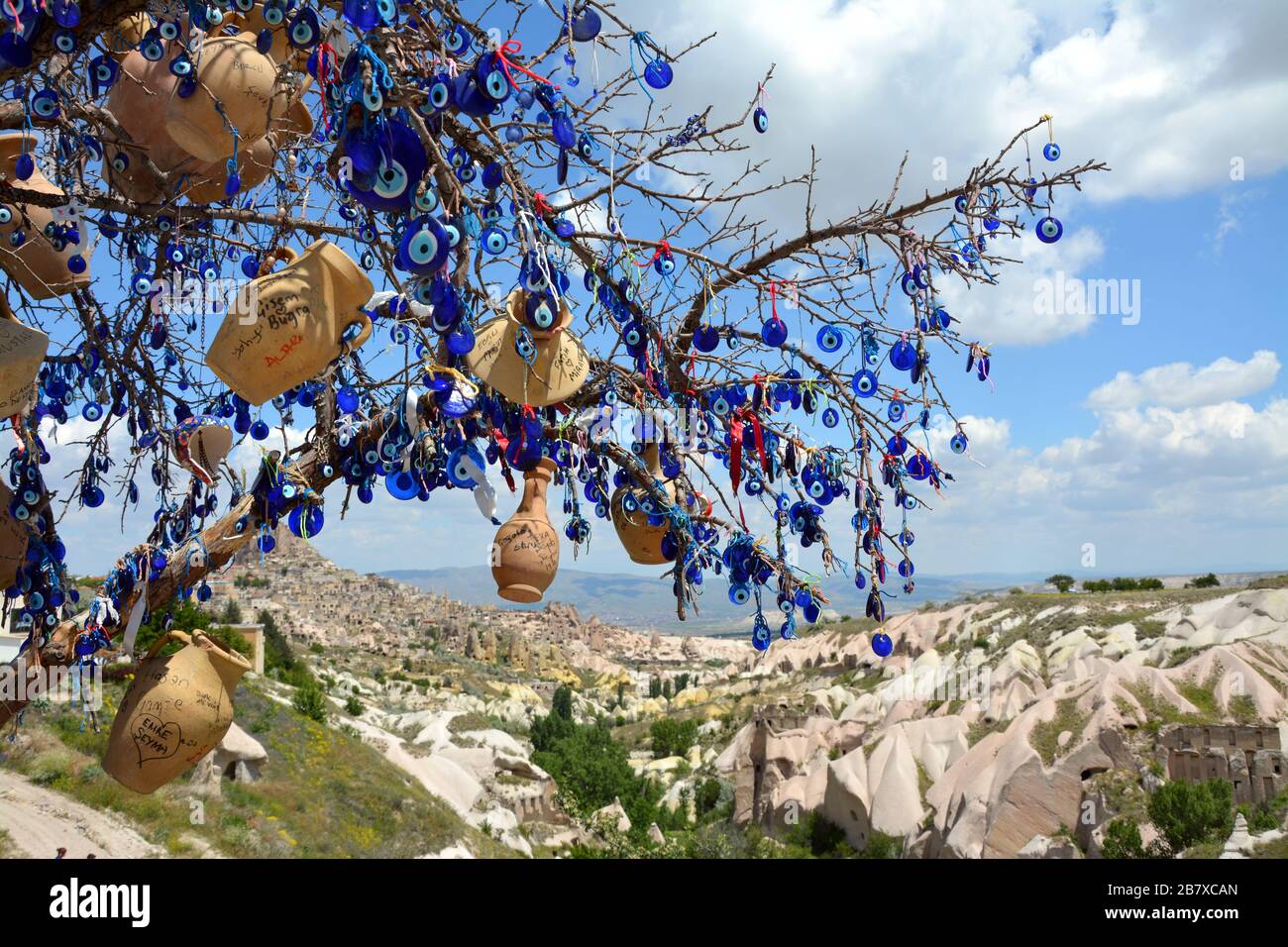 A tree decorated with many Nazar Boncuk in Cappadocia : r