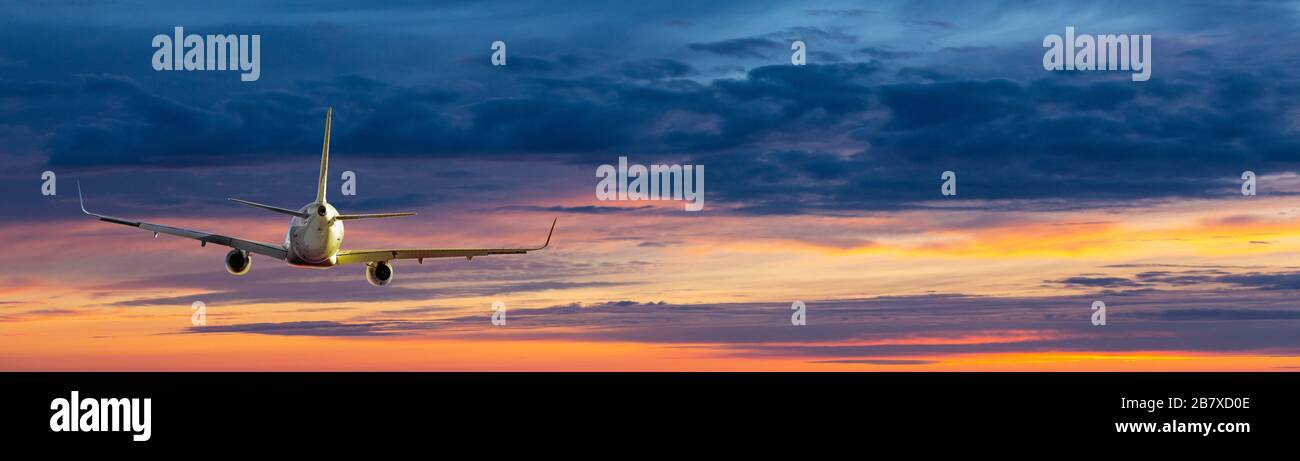 Airplane. Landscape with big white passenger airplane is flying in the ...