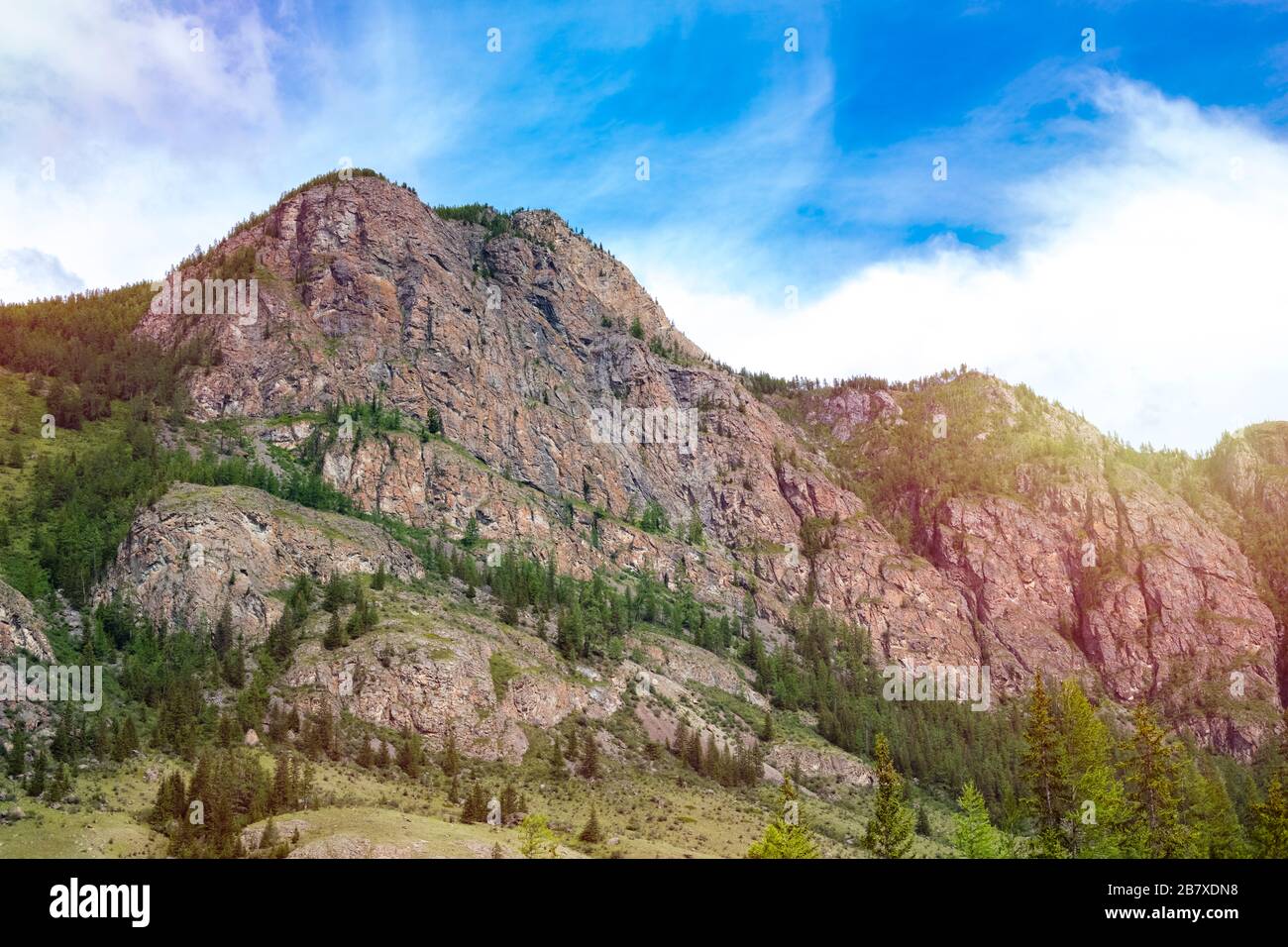 part of the Altai rocky mountains against the blue sky. Beautiful nature of Siberia in Russia Stock Photo